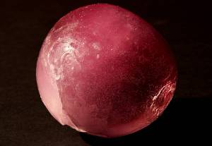 Ice Marble made with food colors and water in a balloon in the freezer.