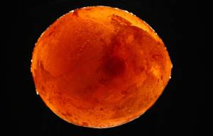 Ice Marble made with food colors and water in a balloon in the freezer.