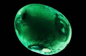 Ice Marble made with food colors and water in a balloon in the freezer.