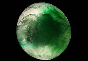 Ice Marble made with food colors and water in a balloon in the freezer.