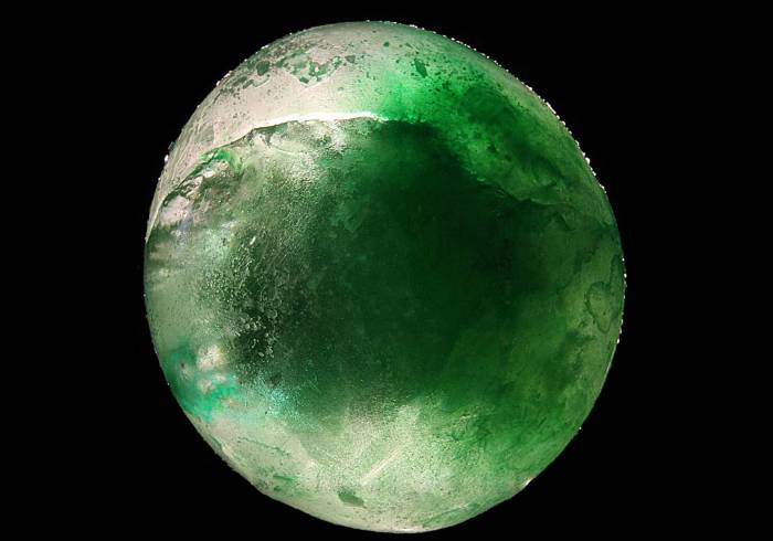 Ice Marble made with food colors and water in a balloon in the freezer.